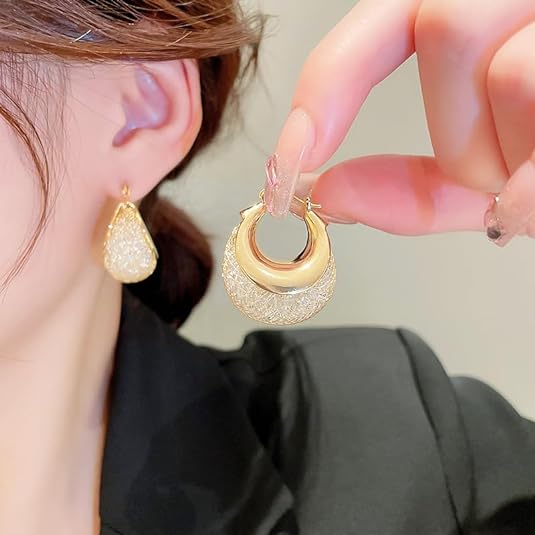 Adornos para las orejas Aura Huggie Elegance